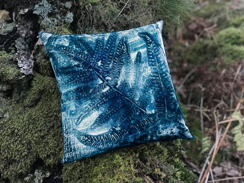 This image shows a cushion cover designed by Marie Rottier, entitled "Fern Pillow"  
2022
Digital reproduction of monoprint on fabric cushion cover. 